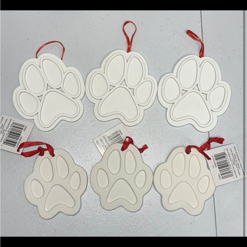 White Paw Print Ornaments with Red Ribbon